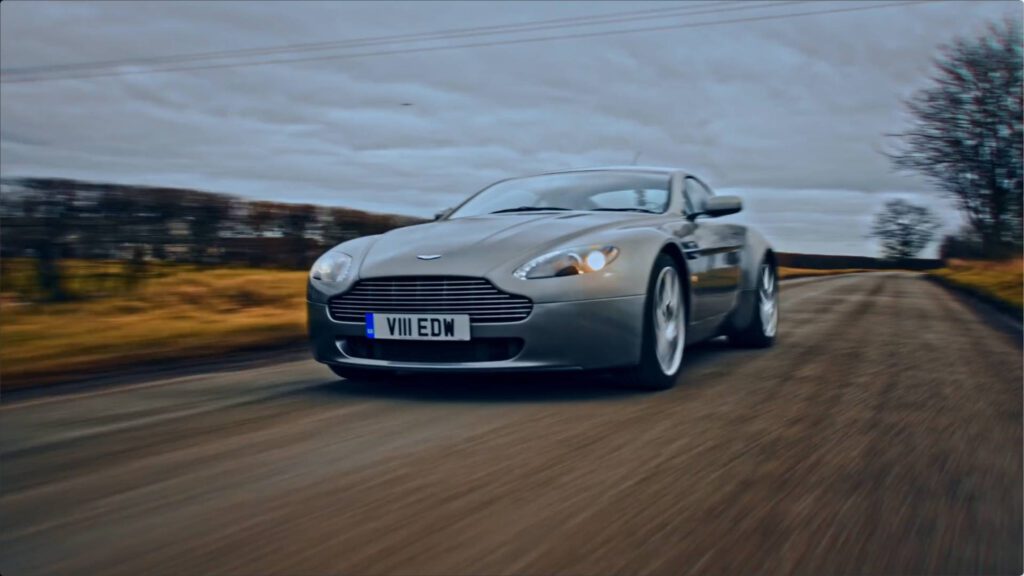 aston martin on road running from front left angle – Lumira Studio