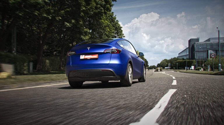 Arlon Premiere Colour Changing Tesla Model 3_BACK – Lumira Studio Arlon Premiere Colour Changing Tesla Model 3 running on road – Lumira Studio