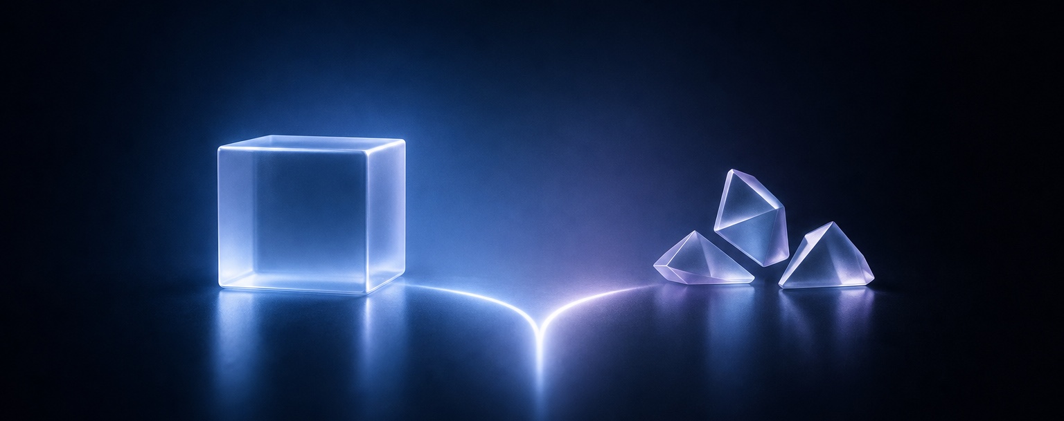 Neon blue translucent cube on the left connected by a glowing line to three glass-like prisms on the right in a dark studio setting. – Lumira Studio